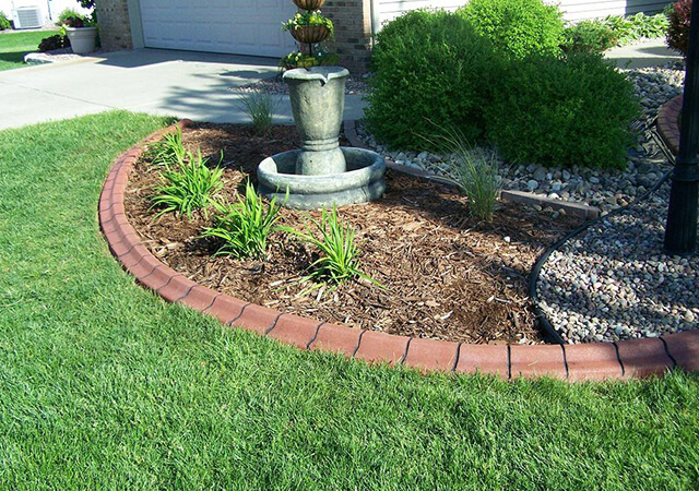 Brick edging best sale for flower beds